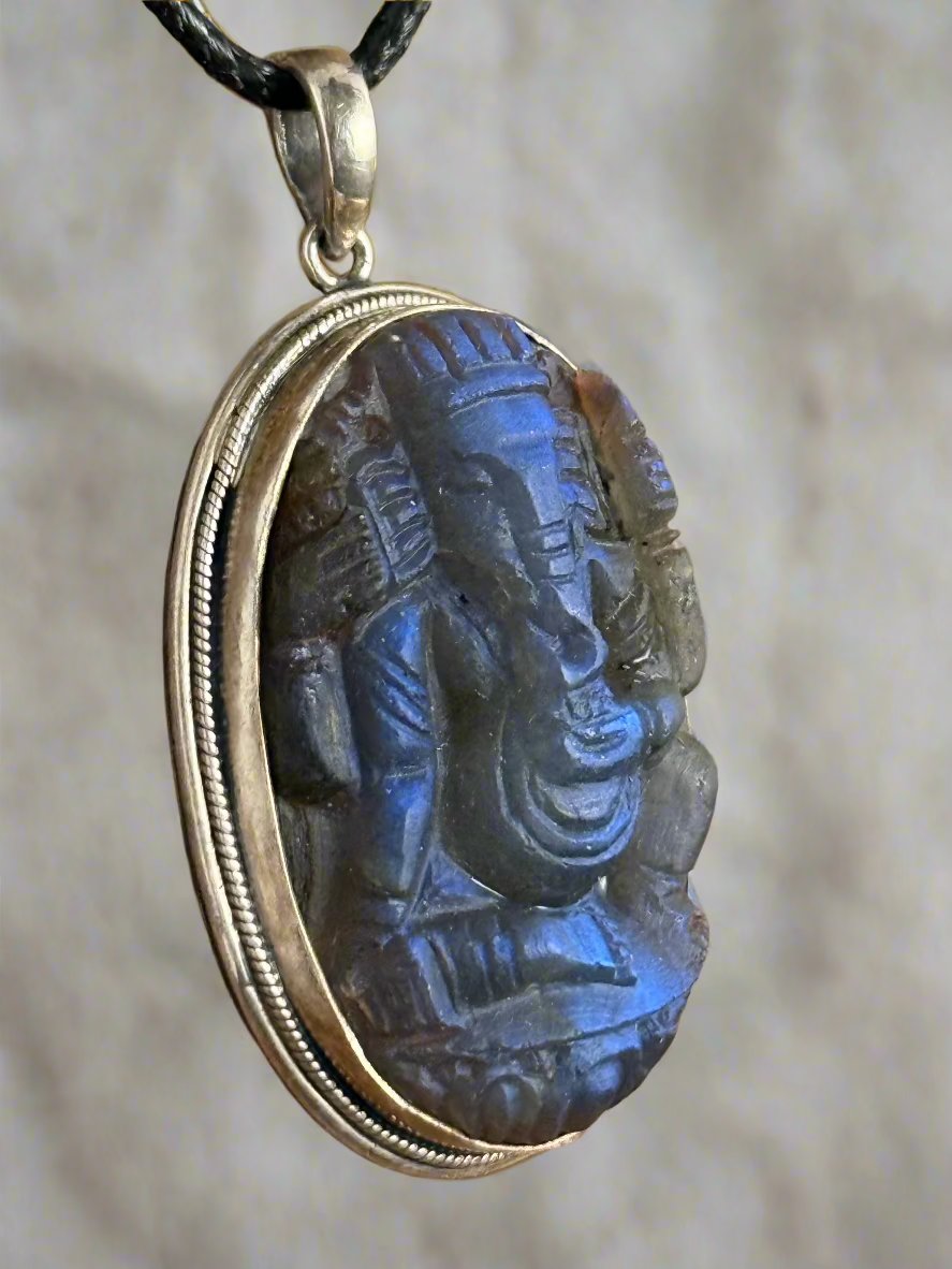 Close up of handmade opal necklace pendent