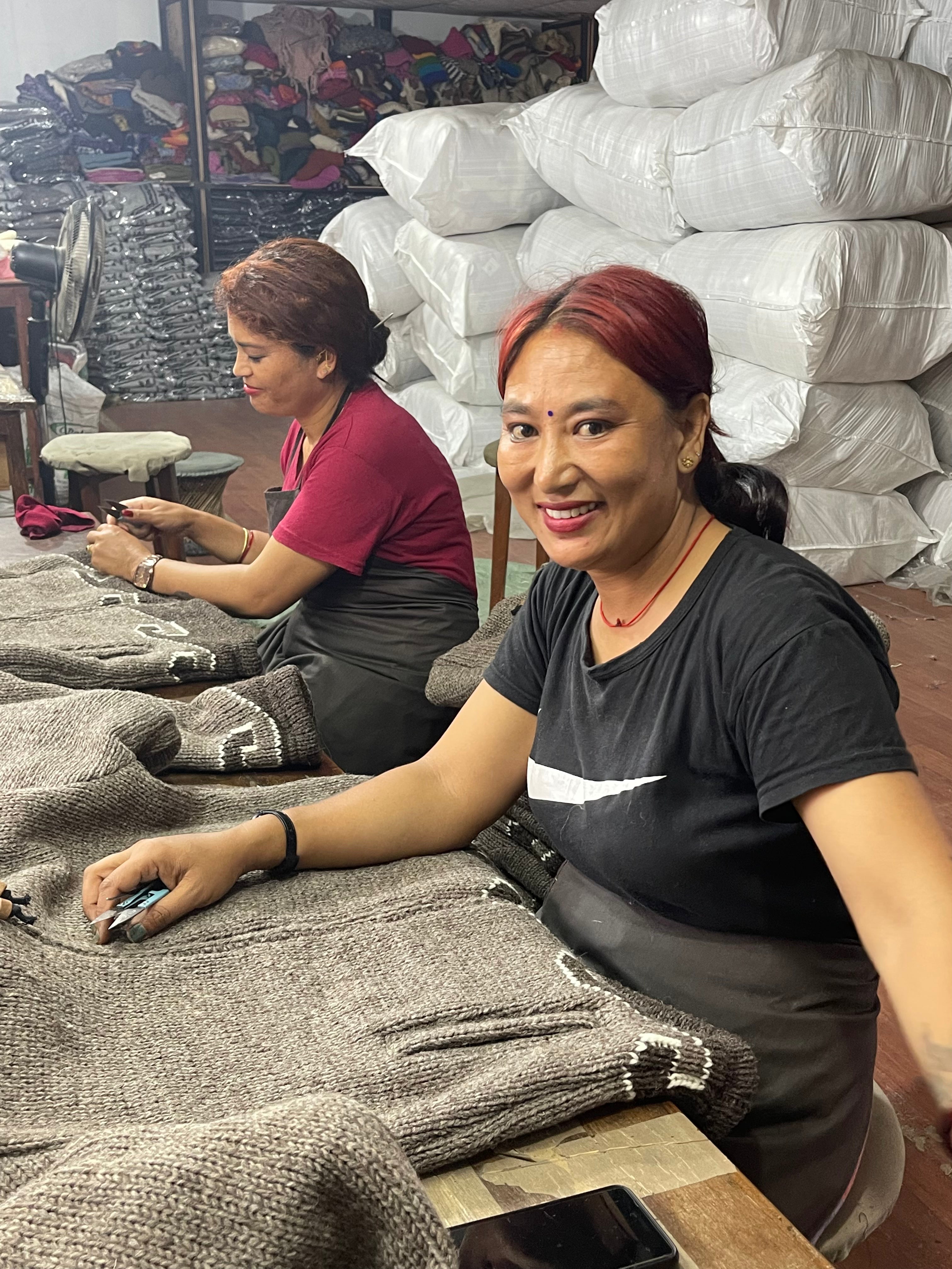 Woolen jumpers being handcrafted in Nepal